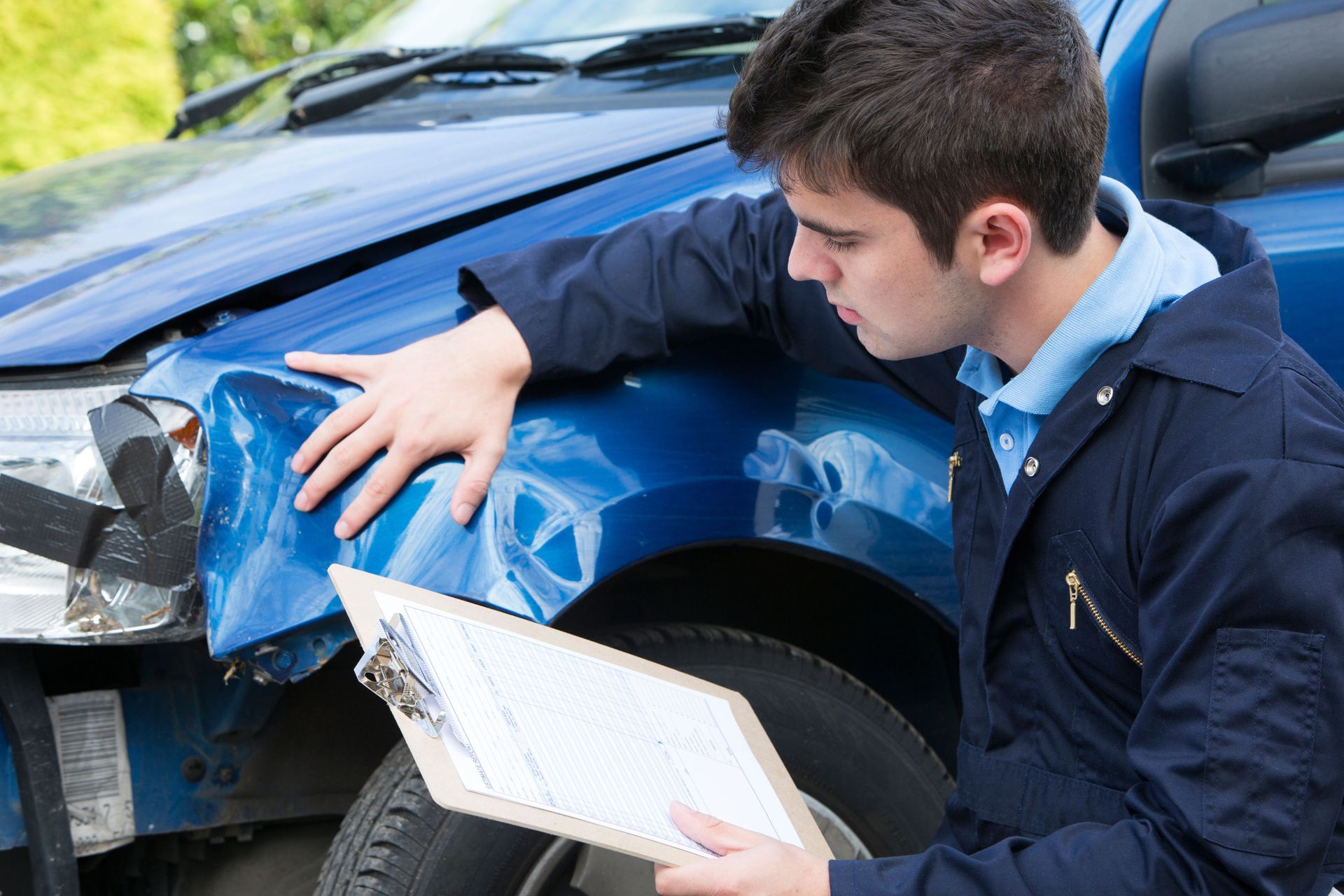 Driver comparing auto insurance coverage
